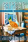 Pressing the Issue (Cookbook Nook Mystery, #6)